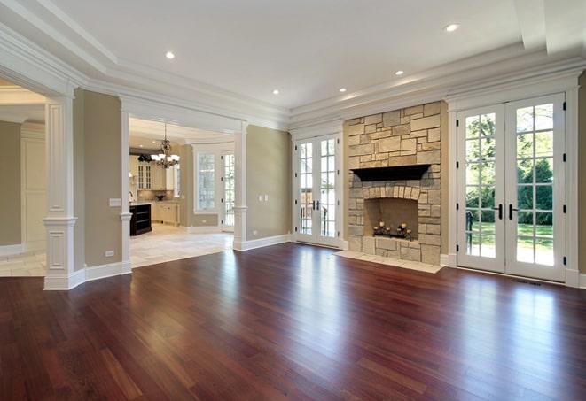 rich, warm-toned hardwood flooring in a rustic cabin